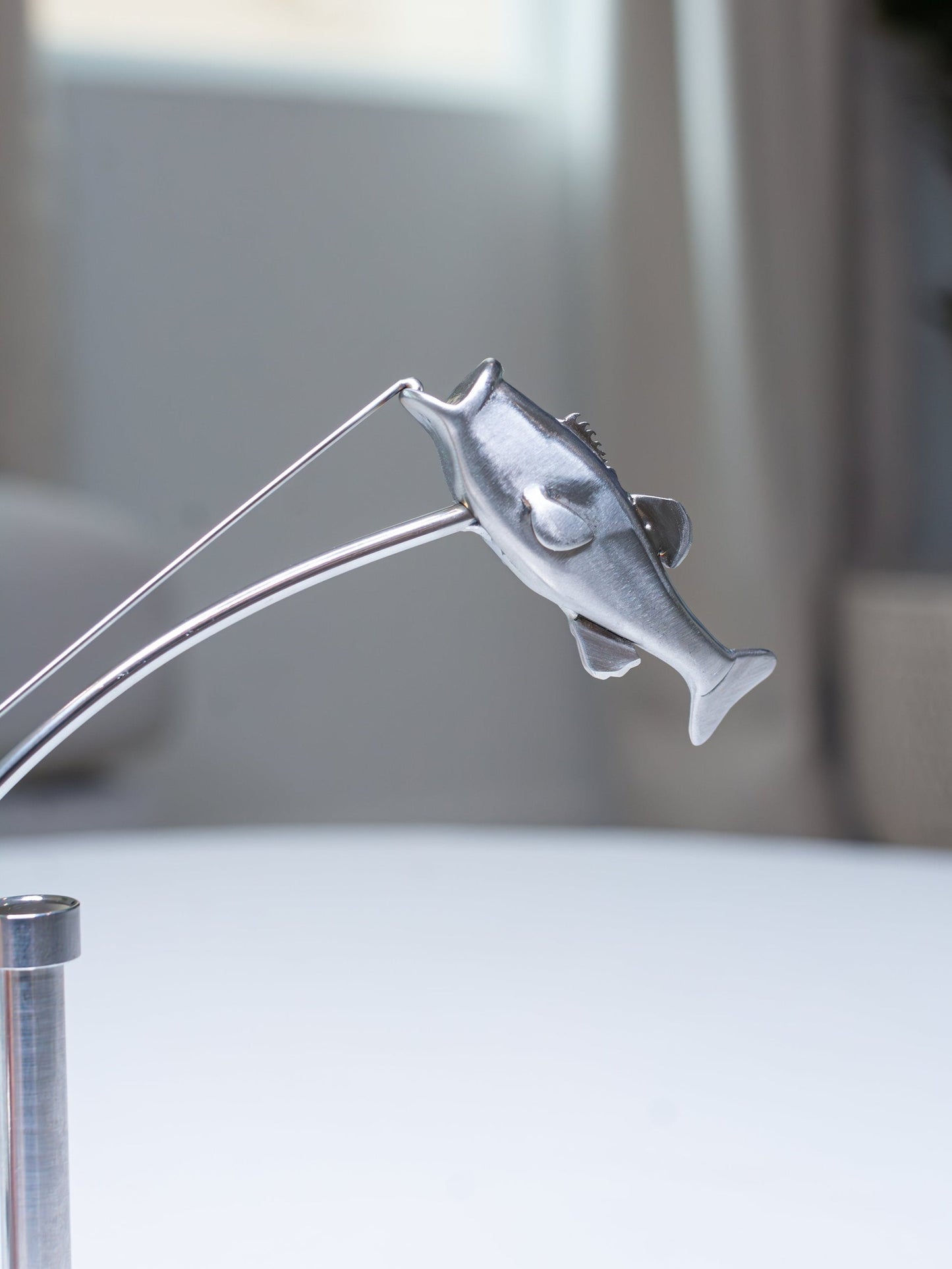 Balanssculptuur van de Visser