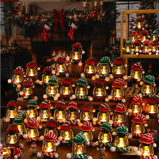 Mini sneeuwpop lantaarn met mutsen en sjaals